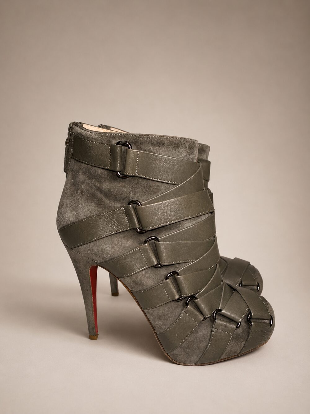 Grey suede ankle boots with leather straps